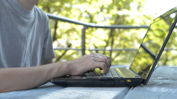 Working Hands on Laptop Keyboard Working Hands on Laptop Keyboard