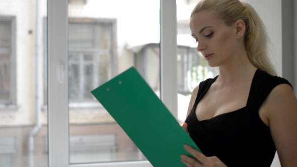 Woman Reading Documents Woman Reading Documents