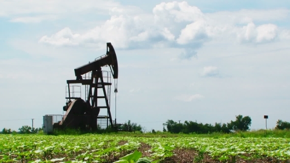 Industrial Pump Moving While Producing Oil Gas 