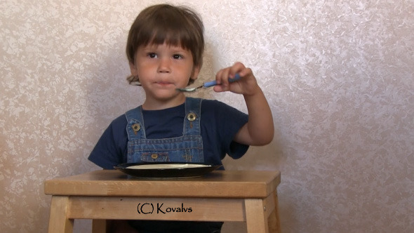 Boy Eating Porridge
