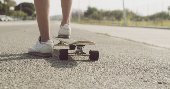 Skater Man Waiting For Someone At The Street alt