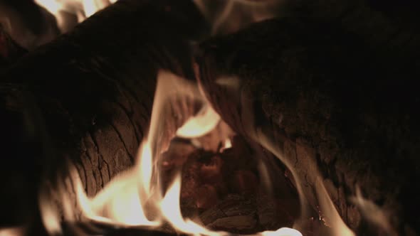 Fireplace Fire And Logs In A Stove