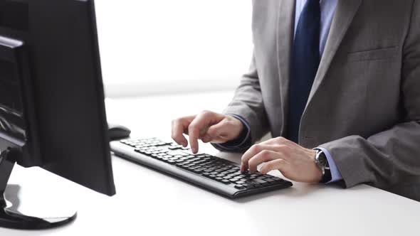 Close Up Of Businessman Hands Typing On Keyboard 2 alt