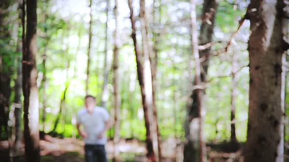 Man Running Alone In The Forest On A Beautiful Day
