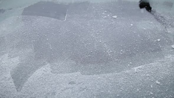 Man Scraping A Frozen Car Windshield With Audio 1