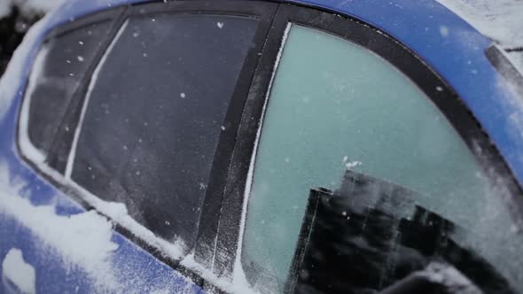Man Scraping A Frozen Car Windshield With Audio 2