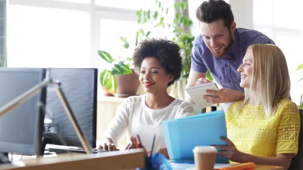 Happy Creative Team With Computers In Office 17 alt