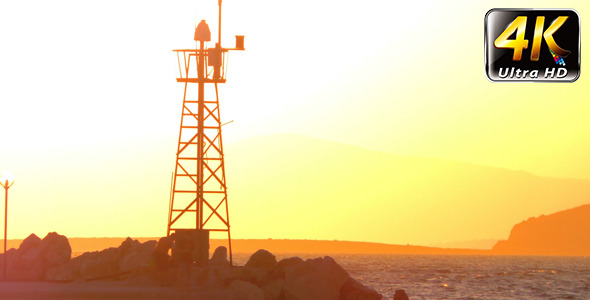 Lighthouse and the People Silhouette in Sunset Lighthouse and the People Silhouette in Sunset