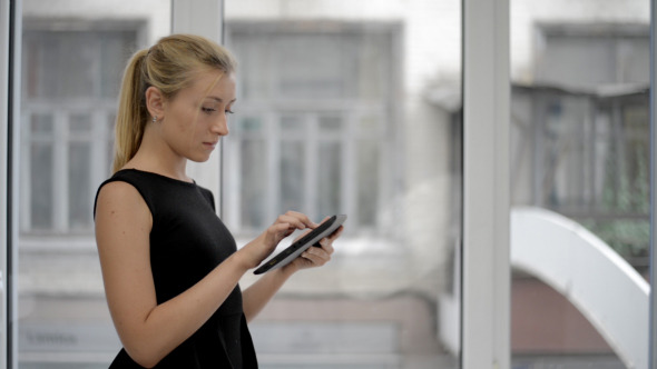 Girl Scrolling on Tab Girl Scrolling on Tab