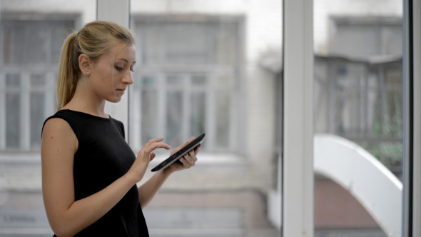 Girl Using Digital Tab Girl Using Digital Tab