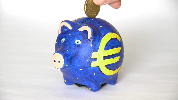 Coins Move Down In A Piggy Bank