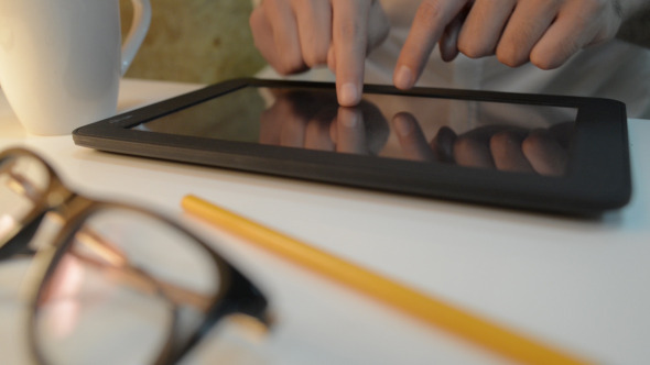 Drinking Coffee and typing on Tablet 2 Drinking Coffee and typing on Tablet 2