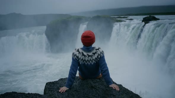 Man In Wool Sweater On Edge Of Waterfall Rock By Derepentebcn Wool Sweater On Edge Of Waterfall Rock