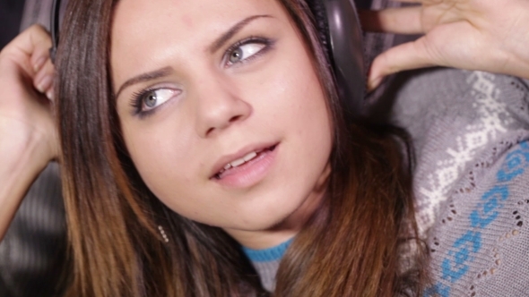 Girl With Headphones Sofa Relax
