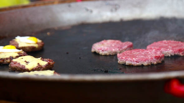 Cooking a Burger in a Large Skillet Cooking a Burger in a Large Skillet