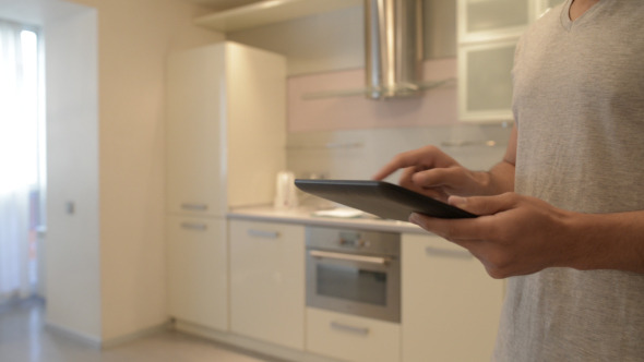 Using Tablet in KItchen Using Tablet in KItchen