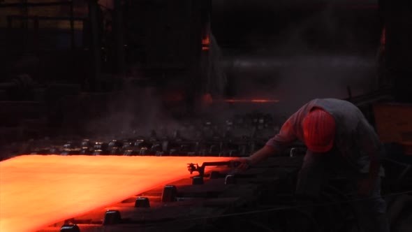 Rolled Sheets of Metal Red Hot Metal Worker Rolled Sheets of Metal Red Hot Metal Worker