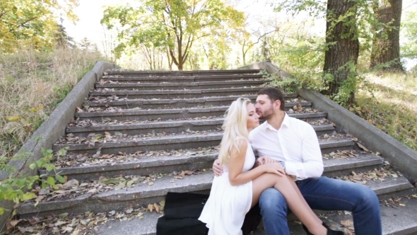 Couple Sitting On Stairs