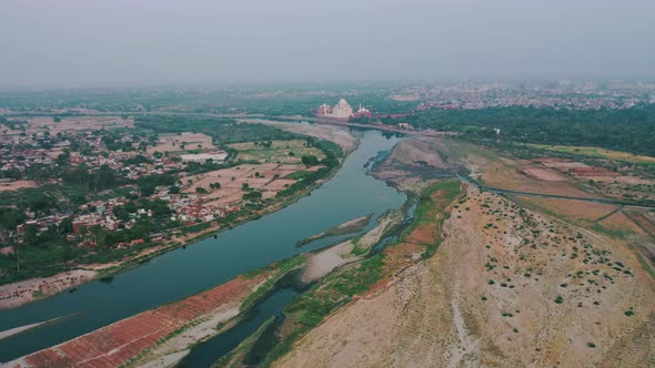 A Beautiful Aerial Shot of Taj Mahal and River Yamuna Flowing Alongside in Agra , Uttar Pradesh alt