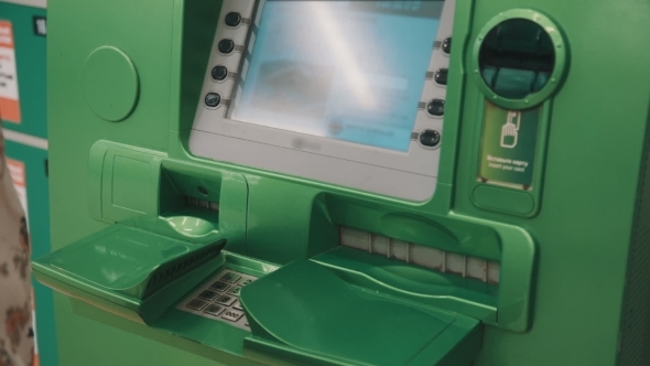 Woman Using Atm Woman Using Atm