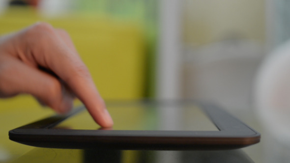 Tablet in Use 2 Tablet in Use 2