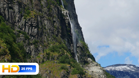 Large Waterfall in Mountains Large Waterfall in Mountains