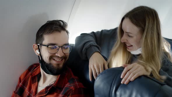 Friends on Airplane Board Travelling Together After Pandemic Time alt