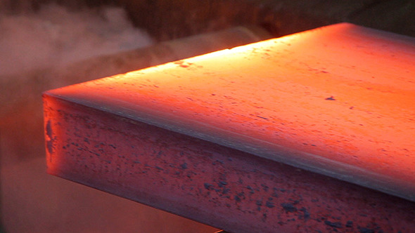 Hot Steel Ingots On Conveyor