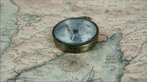 The Compass and the Map on the Table