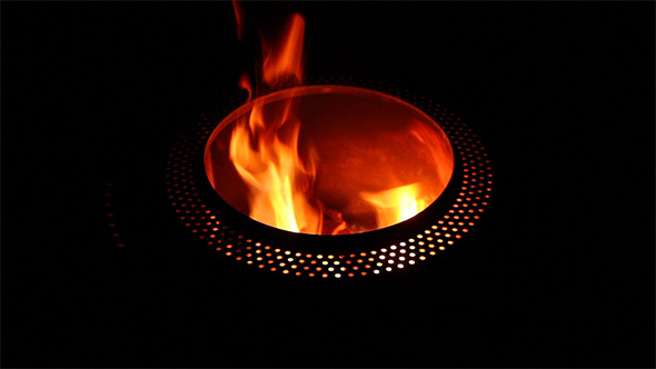 Burning Fire Barrel at Night