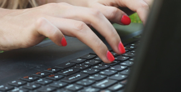Girl Typing on a Laptop Girl Typing on a Laptop