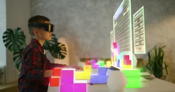 Boy Playing VR Tetris alt
