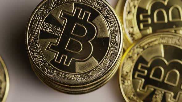 Rotating shot of Bitcoins  alt