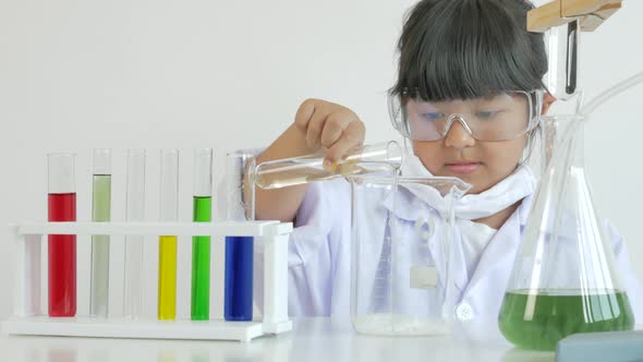 Children play and learn chemical in laboratory