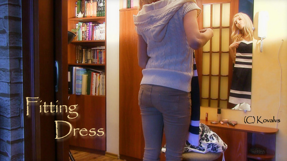 Girl Tries On A Dress 
