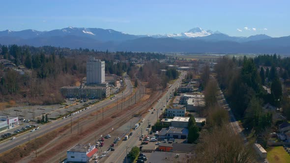 Beautiful Drone View of South Fraser Way in Abbotsford British Columbia as Traffic Moves on the Road alt