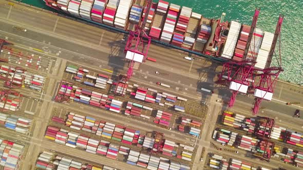 Aerial top view of container cargo ship in the export and import business and logistics alt