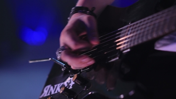 Man Playing Guitar alt