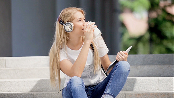 Happy Young Woman With Vintage Music Headphones
