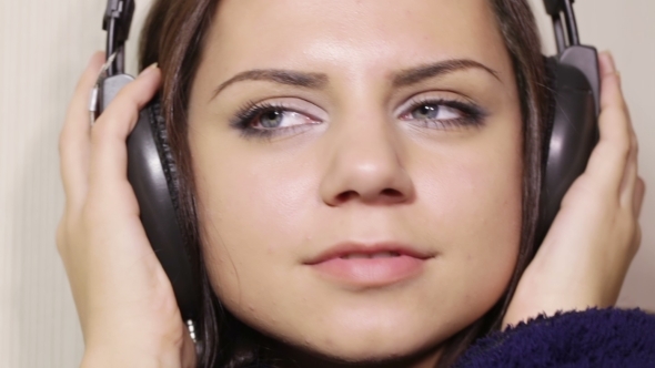 Girl Bathrobe In Headphones 