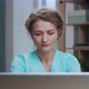 Female Medical Doctor Working at Desk in Medical Office on Laptop Close Up - VideoHive Item for Sale