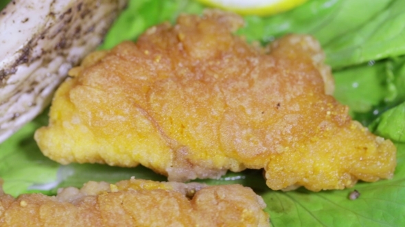 Roasted Fish And Fish Roe On Leaves Of Lettuce