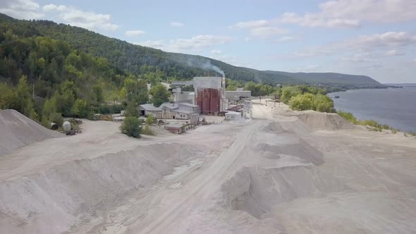 Aerial Panorama of Big Area of Limestone Plant in Quarry Near River, Mining