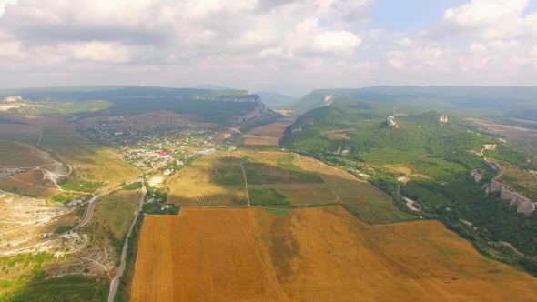 Bird's Eye View Of Hilly Locality And Harvest