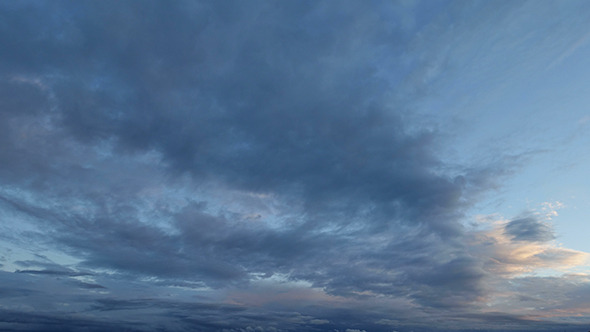 The Movement of the Clouds at Sunset