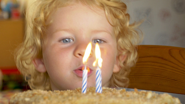 Little Boy Celebrating Here Second Birthday