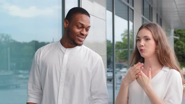 Multiracial Couple Multiethnic Relations Two Colleagues Friends Afro American Man and Caucasian alt