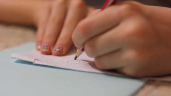 Girl Draws Picture