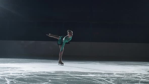 Cute Teen Skater Performs Right Leg Rotation with Body Tilt alt