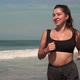 Plussized Woman is Jogging Alone on Sea Beach - VideoHive Item for Sale